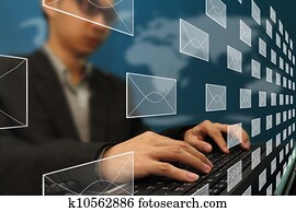 Business man at the office working on e-mail typing Business man at the office working on e-mail typing