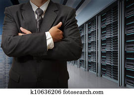 business man engineer in data center server room business man engineer in data center server room