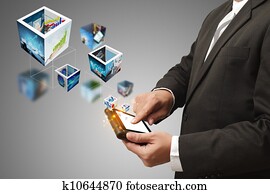 business man hand holding a touch pad computer and 3d streaming images