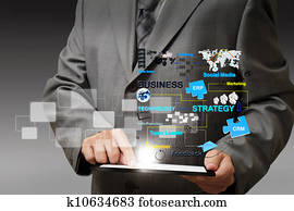 business man hand touch on tablet computer virtual business process diagram