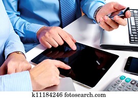 Business people group working with laptop.