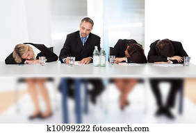 Business people sleeping at the meeting