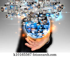 businessman holding business world