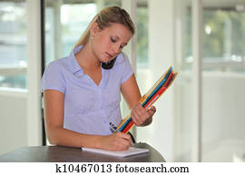 Busy receptionist multitasking