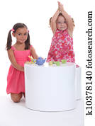 Children having a tea party Children having a tea party