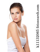 Close-up portrait of beautiful young woman with healthy clean skin on a face