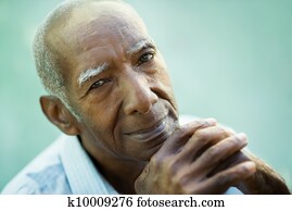 Closeup of happy old black man smiling at camera