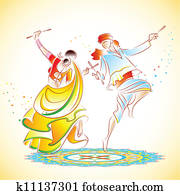 Couple playing Dandiya Couple playing Dandiya