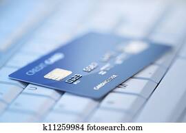Credit card on computer keyboard
