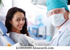 Dentist and patient Dentist and patient
