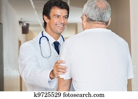 Doctor Assisting Senior Man
