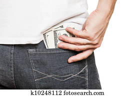 Dollar currency in jeans pocket