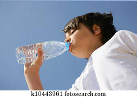 Drinking a bottle of refreshing water
