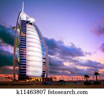 DUBAI, UAE - NOVEMBER 27: Burj Al Arab hotel on NOVEMBER 27, 2011 in Dubai. Burj Al Arab is a luxury 5 stars hotel built on an artificial island in front of Jumeirah beach. Sunset View