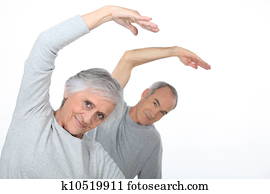 Elderly couple warming up