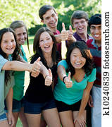 Ethnic Group of happy teenage friends outside