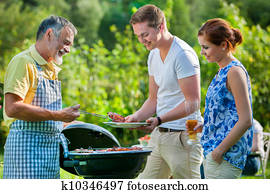 Family having a barbecue party Family having a barbecue party