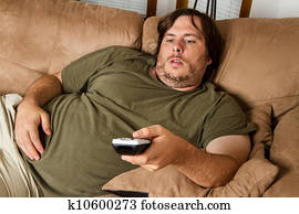 Fat lazy guy on the couch Fat lazy guy on the couch