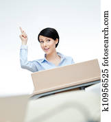 Female speaker at the board