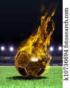 fiery soccer ball on field fiery soccer ball on field