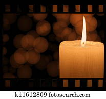 Film strip and candle light Film strip and candle light