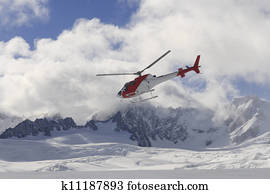 Flying helicopter on glacier Flying helicopter on glacier