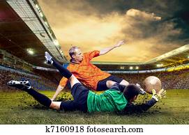 Football player on field of stadium Football player on field of stadium