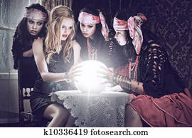 fortune teller with her crystal ball. Illusion fortune teller with her crystal ball. Illusion