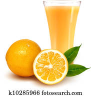 Fresh orange and glass with juice  