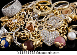 Gold jewelry on a black background Gold jewelry on a black background