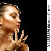 Golden Luxury Makeup. Fashion Girl Portrait