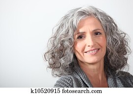 Grey-haired woman on white background