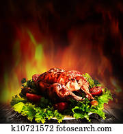 Grilled chicken over salad on the wooden desk Grilled chicken over salad on the wooden desk