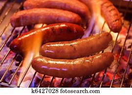 Grilling bratwursts Grilling bratwursts