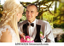 Groom looking on bride Groom looking on bride