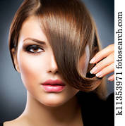 Hair. Beauty Girl With Healthy Long Brown Hair 