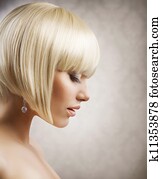 Haircut. Beautiful Girl with Healthy Short Blond Hair. Hairstyle 