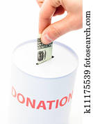 Hand donating money