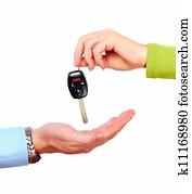 Hand with a car key.