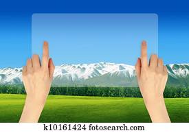 Hand with digital screen with landscape background