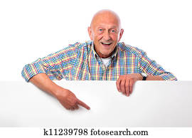 happy smiling senior man holds a blank board