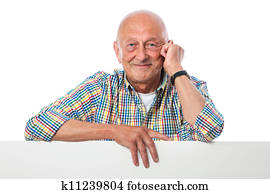 happy smiling senior man holds a blank board