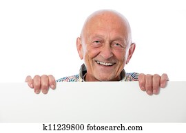 happy smiling senior man holds a blank board