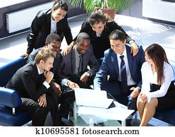 Happy working business team in modern office