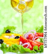 Healthy lifestyle. Fresh salad with oil. Food still life.