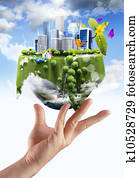 holding a glowing earth globe