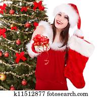  in Santa hat holding christmas socks and gift box.