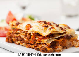 italian lasagna on a square plate 