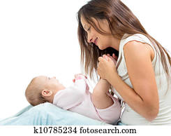 joyful mother playing with her baby infant joyful mother playing with her baby infant