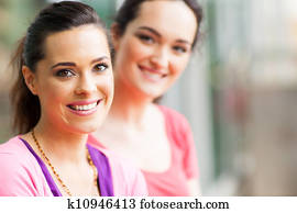 Zwei, junge frau, wählen, a, buch Stock Bild | k10943392 | Fotosearch